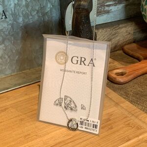 #131 Over 1 ctw Moissanite clock style necklace